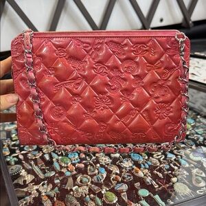 CHANEL Red Embossed Leather Clutch with Chain